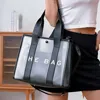 Fashnzfab Optic Transparent Tote Bag In Black