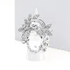 Fashnzfab Oval Stone Accented Leaf Cluster Stretch Ring In Metallic