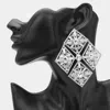 Fashnzfab Oversized Glass Stone Embellished Diamond Frame Chandelier Evening Earrings In Metallic