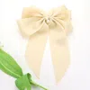 Fashnzfab Oversized Pearl Dangle Pointed Bow Barrette In Neutral
