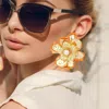 Fashnzfab Oversized Pearl Pointed Enamel Painted Rim Hammered Metal Flower Earrings In Orange