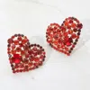 Fashnzfab Oversized Rhinestone Cluster Heart Evening Clip On Earrings In Red