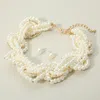 Fashnzfab Pearl Beaded Twisted Multi Strand Statement Necklace In Neutral