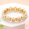 Fashnzfab Pearl Cluster Flower Stretch Bracelet Cream, Gold In Multi