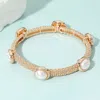 Fashnzfab Pearl Cluster Station Metal Mesh Stretch Bracelet Gold In Gold