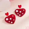 Fashnzfab Pearl Embellished Glittered Resin Heart Dangle Earrings In Red
