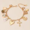 Fashnzfab Pearl Heart Cross Floral Medallion Charm Station Paperclip Chain Bracelet Cream, Matte Gold In Multi