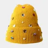 Fashnzfab Pearl Jewel Embellished Fleece Lining Knit Beanie Hat In Yellow
