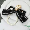 Fashnzfab Pearl Loop Floral Tweed Bow Keychain / Bag Charm In Black