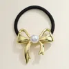Fashnzfab Pearl Metal Bow Pointed Hair Band In Black