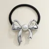 Fashnzfab Pearl Metal Bow Pointed Hair Band In Metallic