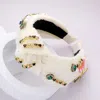 Fashnzfab Pearl Multi Stone Embellished Knot Burnout Lace Headband In Multi