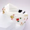 Fashnzfab Pearl Multi Stone Embellished Twisted Headband In White