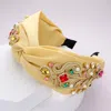 Fashnzfab Pearl Multi Stone Embellished Twisted Headband In Yellow