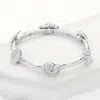 Fashnzfab Pearl Paved Starfish Shell Puka Shell Pointed Stretch Bracelet Rhodium In Multi