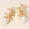 Fashnzfab Pearl Tip Double Metal Starfish Drop Earrings In Gold