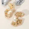 Fashnzfab Pearl Trimmed Fan Clip On Earrings In Gold