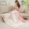 Fashnzfab Pink Ribbons / Bows Reversible Throw Blanket