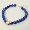 Fashnzfab Polished Metal Bean Accent Bold Marbled Ball Beaded Statement Necklace In Blue