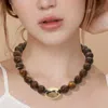Fashnzfab Polished Metal Bean Accent Bold Marbled Ball Beaded Statement Necklace In Brown