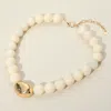 Fashnzfab Polished Metal Bean Accent Bold Marbled Ball Beaded Statement Necklace In Gold