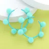 Fashnzfab Pom Pom Station Hoop Earrings In Blue