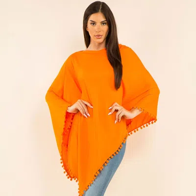 Fashnzfab Pom Pom Trim Solid Asymmetrical Poncho In Orange