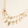 Fashnzfab Pretzel Hamsa Hand Heart Pearl Flower Shell Fishbone Wishbone Quatrefoil Teddy Bear Palm Tree Charm  In Gold