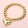 Fashnzfab Puffy Metal Heart Charm Ball Toggle Bracelet Gold In Gold