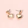Fashnzfab Puffy Metal Heart Dangle Earrings In Gold