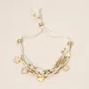 Fashnzfab Quatrefoil Charm Beaded Multi Layered Cord Adjustable Cinch Pull Tie Bracelet In Pattern