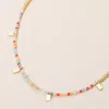 Fashnzfab Rectangular Charm Beaded Choker Necklace In Red