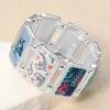 Fashnzfab Rectangular Dolphin Epoxy Cluster Link Stretch Bracelet In Multi