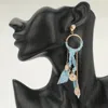 Fashnzfab Religious Medal Drop Fabric Knot Statement Earrings - Light Blue In Blue