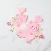 Fashnzfab Resin Cupid Bear With Arrow Dangle Earrings In Pink