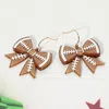 Fashnzfab Resin Football Bow Dangle Earrings In Brown