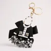 Fashnzfab Resin Jacket Pointed Sequin Bow Keychain / Bag Charm In Black