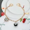 Fashnzfab Retro Casino Cherry Western Boot Charm Station Bag Charm In Multi