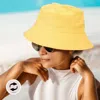 Fashnzfab Reversible Solid Bucket Hat In Yellow