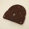 Fashnzfab Rhinestone Cross Accent Teardrop Stone Cluster Embellished Knit Beanie Hat In Brown