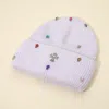 Fashnzfab Rhinestone Cross Accent Teardrop Stone Cluster Embellished Knit Beanie Hat In Purple