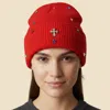 Fashnzfab Rhinestone Cross Accent Teardrop Stone Cluster Embellished Knit Beanie Hat In Red