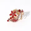 Fashnzfab Rhinestone Embellished Flower High Heel Pointed Stretch Ring In Gold