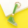 Fashnzfab Rhinestone Pave Sneaker Keychain In Green