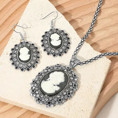 Fashnzfab Rhinestone Paved Cameo Pointed Pendant Necklace In Black