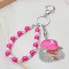 Fashnzfab Rhinestone Paved Cool Afro Woman In Awareness Pink Ribbon Cap Beaded Wristlet Keychain / Bag Charm In Multi