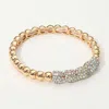 Fashnzfab Rhinestone Paved Dome Beaded Stretch Bracelet Ab, Gold In Multi