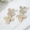Fashnzfab Rhinestone Paved Double Flower Link Drop Evening Earrings - Clear, Gold In Gold
