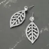 Fashnzfab Rhinestone Paved Leaf Dangle Evening Earrings In Multi