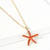 Fashnzfab Rhinestone Paved Starfish Pendant Necklace In Gold